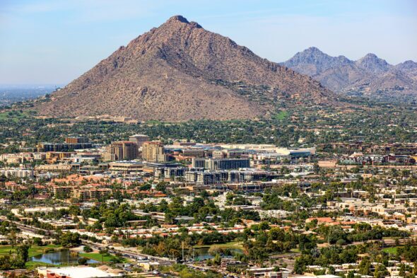 Camelback,Mountain,And,The,Skyline,Of,Old,Town,Scottsdale,,Arizona
