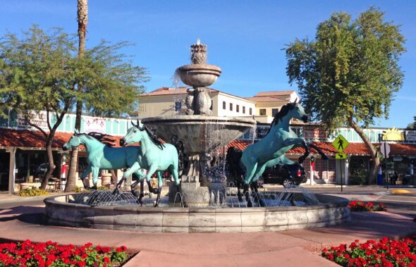 Bronze,Horse,Fountain,On,The,Corner,Of,5th,Avenue,In